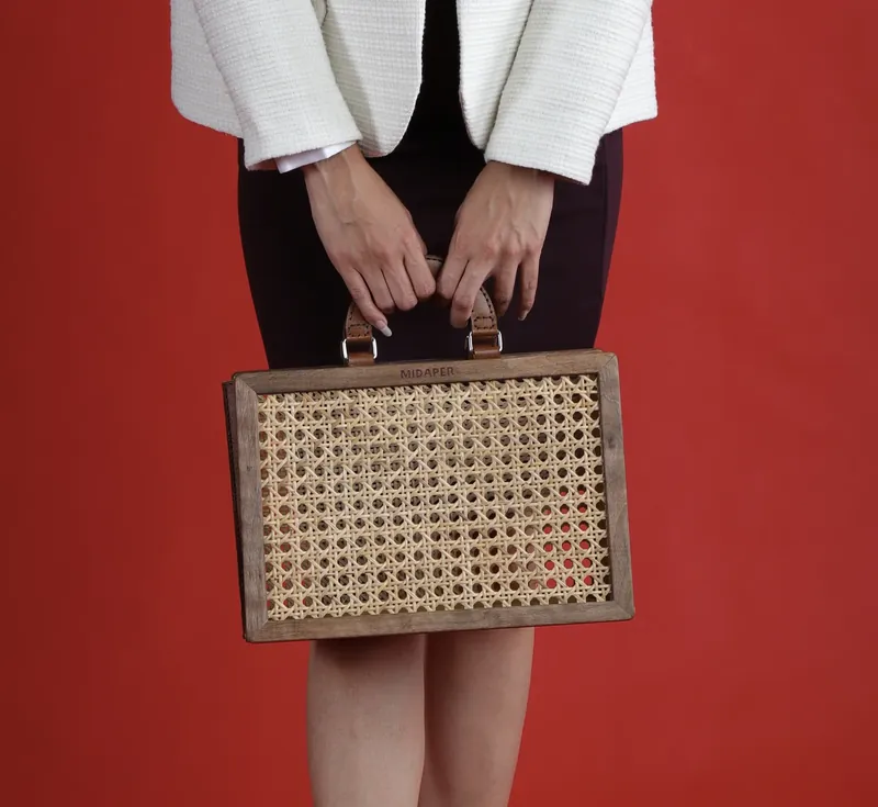 Straw bag in hand